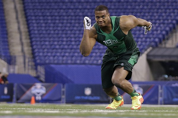 Where did Trey Flowers play football in college? (Factoid 1,010)