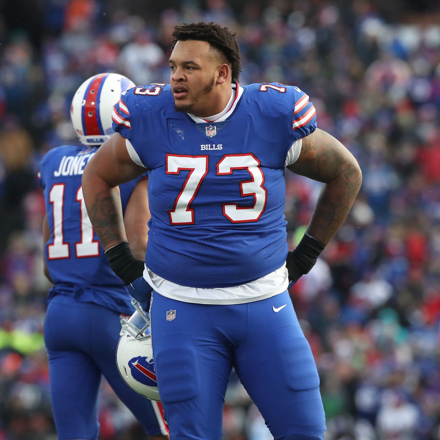 Buffalo Bills tackle Dion Dawkins (73) runs on the field during