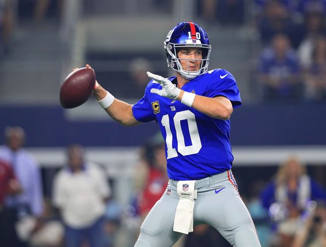 New York Giants on Twitter: Eli Manning wearing @Nike cleats tonight that  include grass taken from his high school football field. #GiantsPride   / Twitter