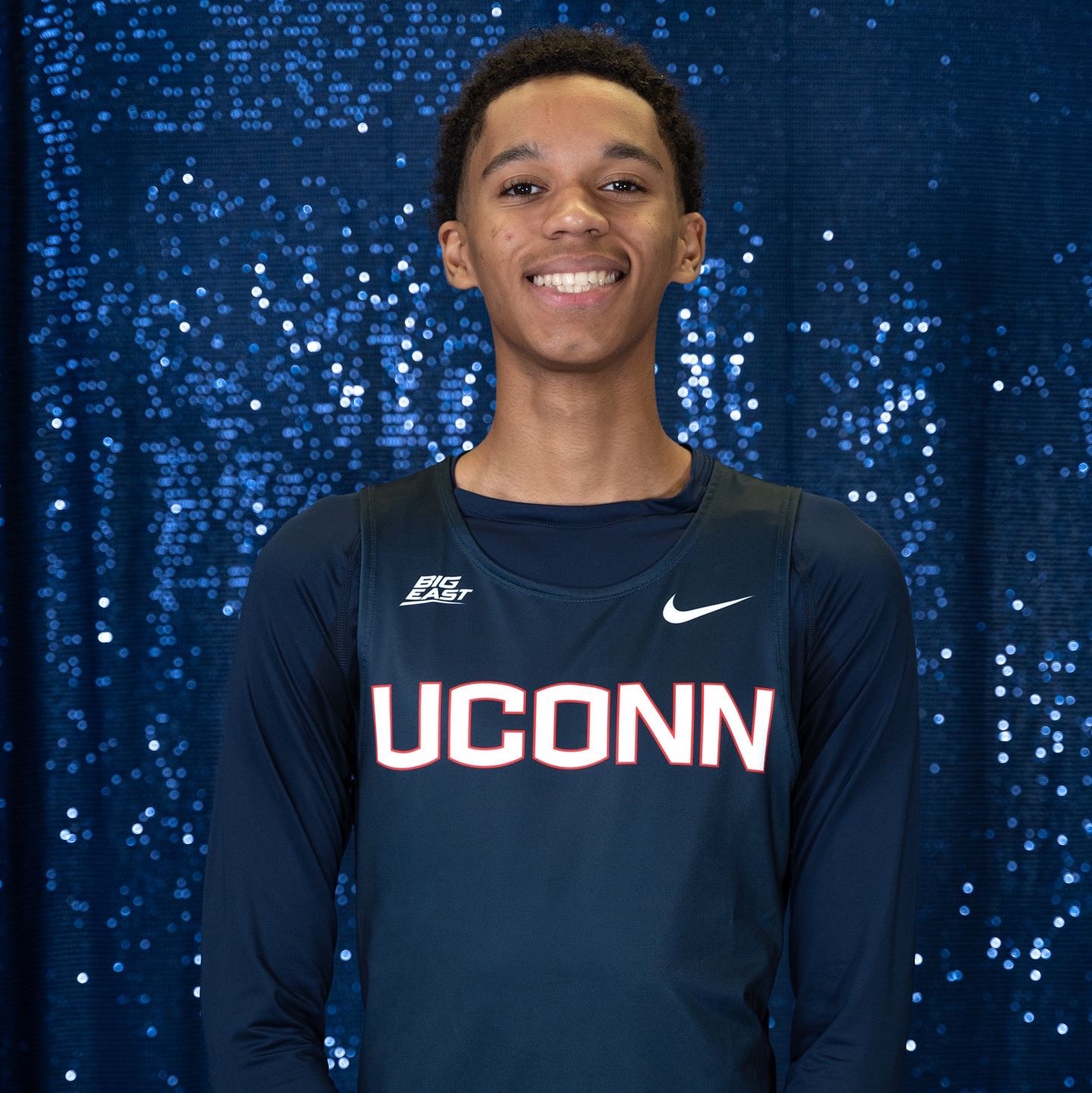 Enaji Muhammad athlete profile head shot