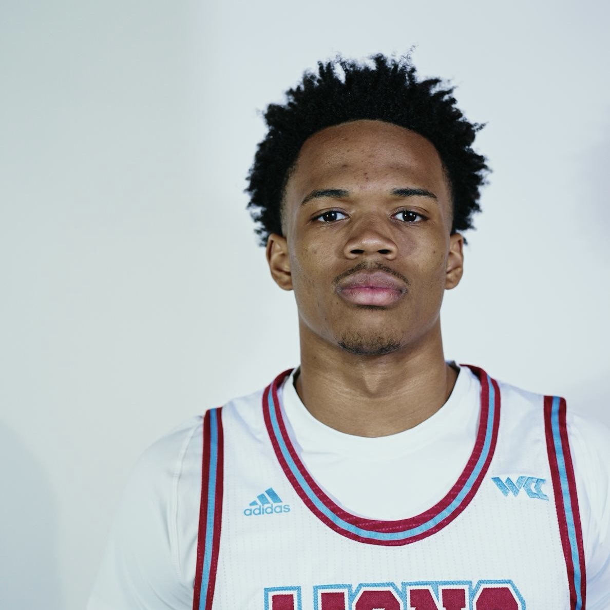 aj thomas athlete profile head shot