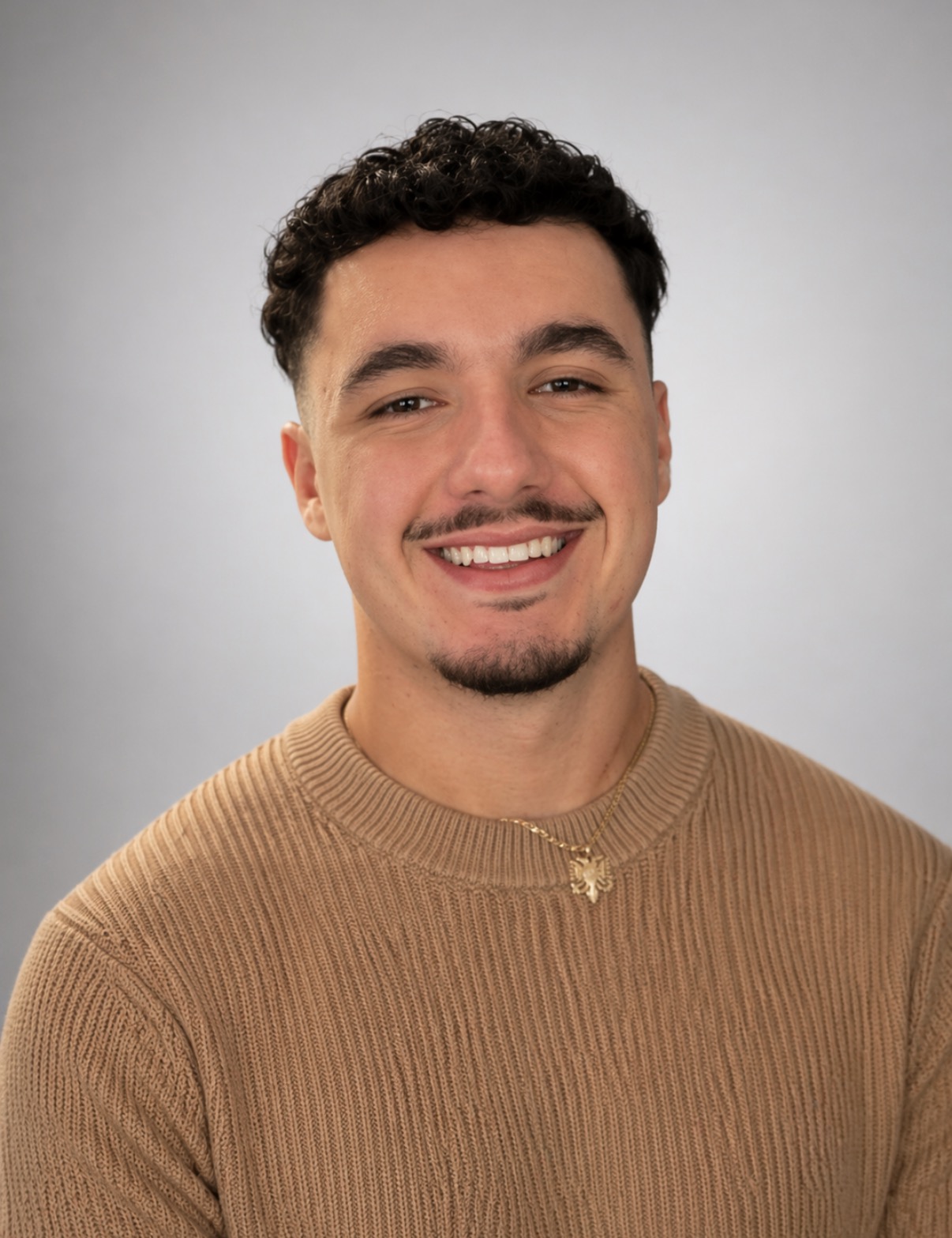 Enio Hoxha athlete profile head shot